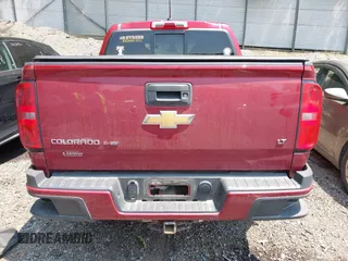 2018 Chevrolet Colorado 4WD LT z VIN 1GCGTCENXJ1214811, wystawiony jako IAAI lot #42418878 z przebiegiem 80 453 mil mil oraz . Historia ofert i sprzedaży dostępna na DreamBid. Obrazek 16.