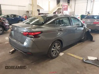 2021 Nissan Versa SV with VIN 3N1CN8EV1ML874144, listed as a IAAI auction lot 41563074 with 64,088 mi miles. Bid and sale history available at carsss.com. Image 4.