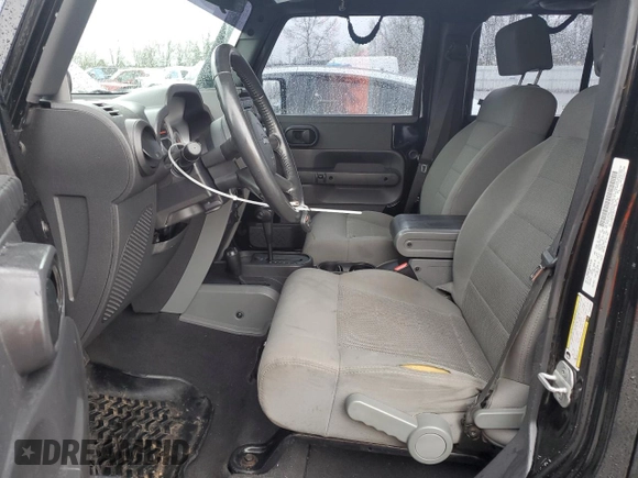 2008 Jeep Wrangler Unlimited Rubicon with VIN 1J4GA69188L642528, listed as a Copart auction lot 50103815 with 165,703 mi miles and Salvage Title. Bid and sale history available at carsss.com. Image 7.