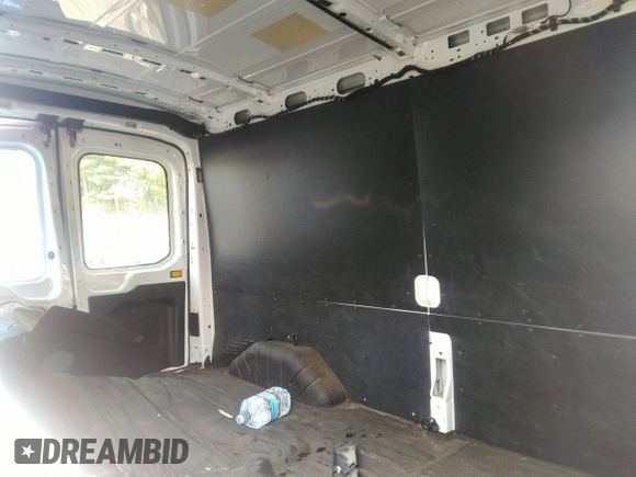 2016 Ford Transit Cargo with VIN 1FTYR2CM5GKB14156, listed as a IAAI auction lot 37079677 with 172,993 mi miles and . Bid and sale history available at DreamBid. Image 8.