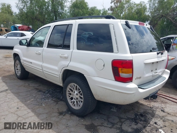 2002 Jeep Grand Cherokee Limited with VIN 1J4GX58S52C305020, listed as a IAAI auction lot 42025324 with 214,214 mi miles and . Bid and sale history available at DreamBid. Image 3.