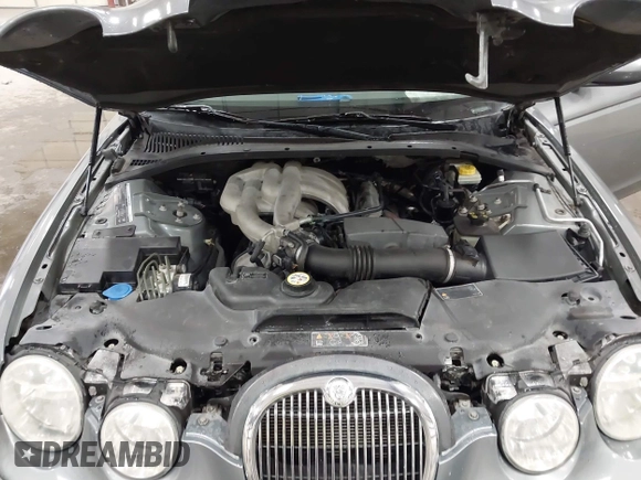 2005 Jaguar S-Type with VIN SAJWA01T85FN43991, listed as a IAAI auction lot 42055271 with 114,454 mi miles and . Bid and sale history available at DreamBid. Image 10.