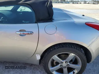 2006 Pontiac Solstice z VIN 1G2MB35B56Y116249, wystawiony jako Copart lot #77471704 z przebiegiem Nie podano mil oraz Nie do naprawy • Non repairable. Historia ofert i sprzedaży dostępna na DreamBid. Obrazek 12.