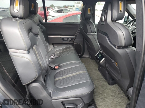 2023 Rivian R1S Adventure with VIN 7PDSGBBA5PN021048, listed as a Copart auction lot 44407815 with 10,642 mi miles and Salvage Title. Bid and sale history available at carsss.com. Image 11.