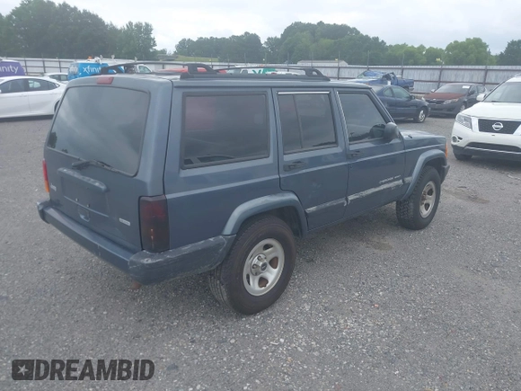 2001 Jeep Cherokee Sport with VIN 1J4FT48S61L594229, listed as a IAAI auction lot 42520336 with 190,862 mi miles and . Bid and sale history available at DreamBid. Image 4.