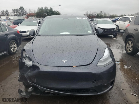 2024 Tesla Model Y Long Range with VIN 7SAYGDEE0RA250394, listed as a Copart auction lot 49163775 with 0 mi miles and Salvage Title. Bid and sale history available at carsss.com. Image 5.