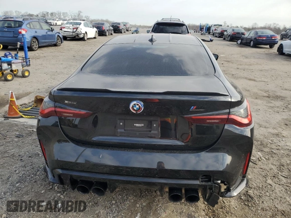 2023 BMW M4 Competition xDrive with VIN WBS43AZ05PCM59611, listed as a Copart auction lot 50389065 with 14,205 mi miles and Salvage title. Bid and sale history available at DreamBid. Image 6.