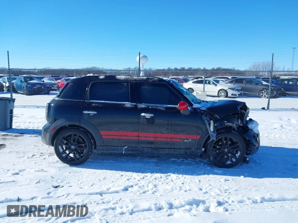 2011 MINI Countryman S with VIN WMWZC5C50BWL55234, listed as a IAAI auction lot 41323339 with 134,709 mi miles and . Bid and sale history available at DreamBid. Image 14.