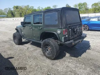 2008 Jeep Wrangler Unlimited Sahara with VIN 1J4GA59158L550576, listed as a Copart auction lot 53095565 with 208,434 mi miles and Salvage Title. Bid and sale history available at DreamBid. Image 2.