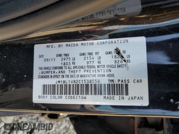 2012 Mazda 3 i Touring with VIN JM1BL1V82C1538556, listed as a Copart auction lot 59543215 with 126,297 mi miles and Salvage title. Bid and sale history available at DreamBid. Image 12.