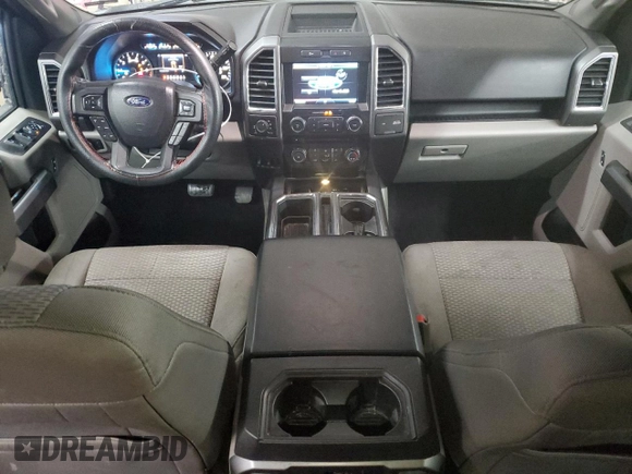 2015 Ford F-150 XLT with VIN 1FTEW1EP7FFC49319, listed as a Copart auction lot 56142895 with 125,052 mi miles and Salvage title. Bid and sale history available at DreamBid. Image 8.
