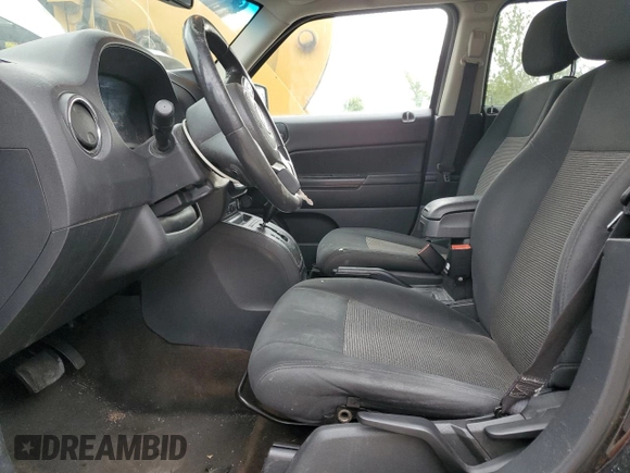 2014 Jeep Patriot Latitude with VIN 1C4NJPFB4ED823020, listed as a Copart auction lot 54746855 with 208,998 mi miles and Clean Title. Bid and sale history available at carsss.com. Image 7.