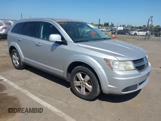 2009 Dodge Journey SXT with VIN 3D4GG57V19T211770, listed as a IAAI auction lot 42095045 with 164,610 mi miles. Bid and sale history available at carsss.com. Image 1.