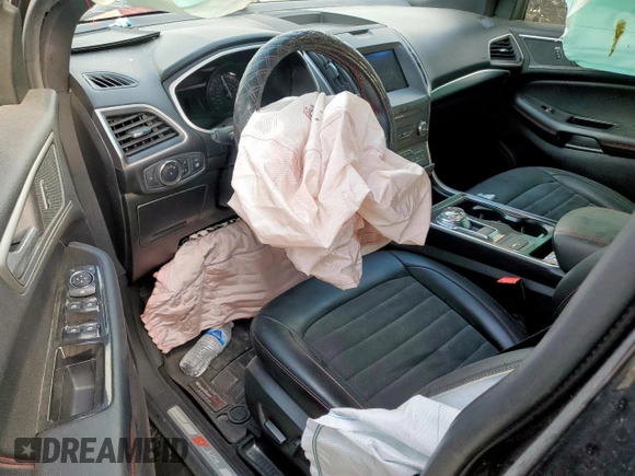 2020 Ford Edge SEL z VIN 2FMPK3J93LBB07159, wystawiony jako Copart lot #56991695 z przebiegiem Nie podano mil oraz Szkoda całkowita • Salvage title. Historia ofert i sprzedaży dostępna na DreamBid. Obrazek 8.