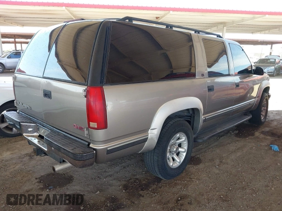 1999 GMC Suburban with VIN 3GKFK16R8XG501843, listed as a IAAI auction lot 42467263 with Not provided miles and . Bid and sale history available at DreamBid. Image 4.