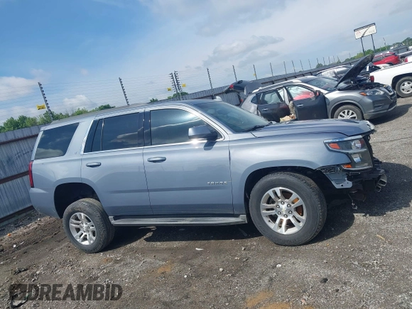 2016 Chevrolet Tahoe LT with VIN 1GNSCBKC2GR257077, listed as a IAAI auction lot 42091171 with 118,660 mi miles and . Bid and sale history available at DreamBid. Image 13.