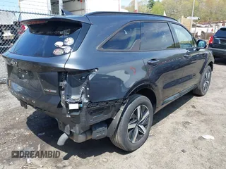 2021 Kia Sorento EX with VIN 5XYRHDLF7MG058307, listed as a IAAI auction lot 42124729 with 81,861 mi miles and . Bid and sale history available at DreamBid. Image 4.