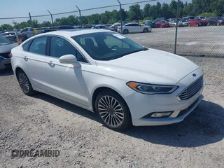 2018 Ford Fusion Titanium with VIN 3FA6P0D98JR134230, listed as a IAAI auction lot 42567084 with 107,459 mi miles and . Bid and sale history available at DreamBid. Image 1.
