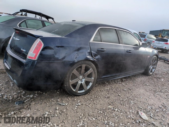2013 Chrysler 300 SRT-8 z VIN 2C3CCAFJ4DH735421, wystawiony jako Copart lot #50936775 z przebiegiem 113 701 mil mil oraz Szkoda całkowita • Salvage title. Historia ofert i sprzedaży dostępna na DreamBid. Obrazek 3.