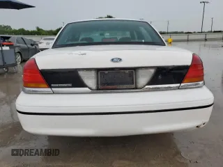 1999 Ford Crown Victoria Police с VIN 2FAFP71W6XX179647, выставлен на аукционе Copart как лот 55151945 с пробегом 124 558 миль миль и Чистый • Clean title. История ставок и продаж доступна на DreamBid. Изображение 6.