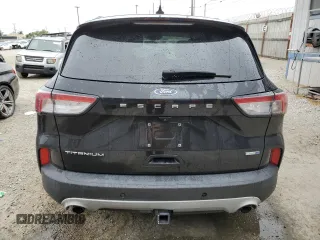 2020 Ford Escape Titanium with VIN 1FMCU9J97LUA59056, listed as a Copart auction lot 58445885 with Not provided miles and Salvage title. Bid and sale history available at DreamBid. Image 6.