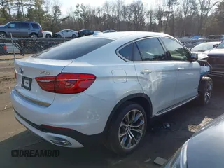 2019 BMW X6 xDrive35i with VIN 5UXKU2C57K0Z63351, listed as a IAAI auction lot 41637597 with 91,121 mi miles. Bid and sale history available at carsss.com. Image 4.