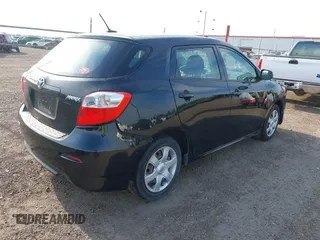 2009 Toyota Matrix with VIN 2T1KU40E69C091858, listed as a IAAI auction lot 41925490 with 153,161 mi miles. Bid and sale history available at carsss.com. Image 4.