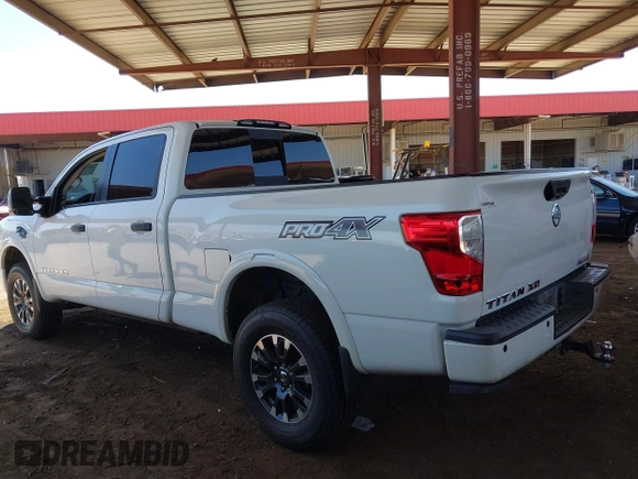 2019 Nissan Titan Pro-4X with VIN 1N6BA1F45KN533051, listed as a IAAI auction lot 42587343 with 134,768 mi miles and . Bid and sale history available at DreamBid. Image 3.