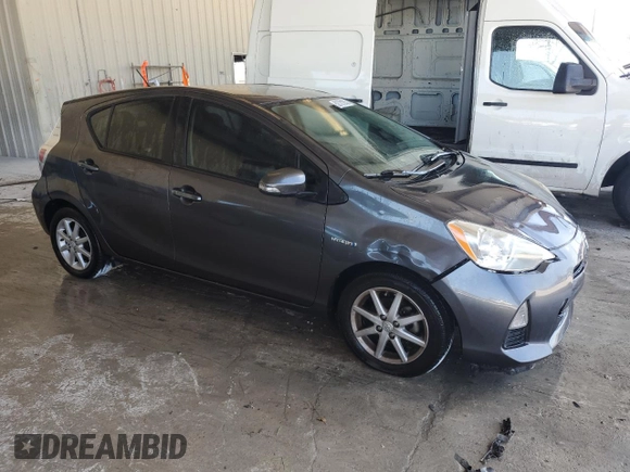2014 Toyota Prius One with VIN JTDKDTB32E1067318, listed as a Copart auction lot 52731255 with 125,239 mi miles and Salvage Title. Bid and sale history available at DreamBid. Image 4.