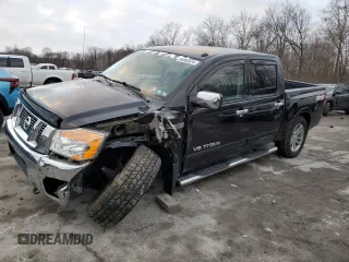 2015 Nissan Titan Pro-4X with VIN 1N6AA0EC2FN501632, listed as a Copart auction lot 84063524 with 92,342 mi miles and Salvage title. Bid and sale history available at DreamBid. Image 1.