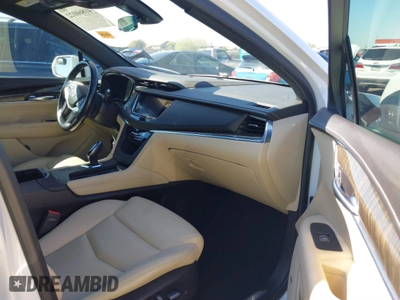 2019 Cadillac XT5 FWD with VIN 1GYKNARS1KZ135419, listed as a IAAI auction lot 41860022 with 63,395 mi miles and . Bid and sale history available at DreamBid. Image 5.