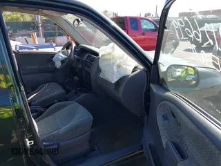 2001 Suzuki Vitara JX z VIN 2S3TD52V416109787, wystawiony jako IAAI lot #42126699 z przebiegiem Nie podano mil oraz . Historia ofert i sprzedaży dostępna na DreamBid. Obrazek 5.