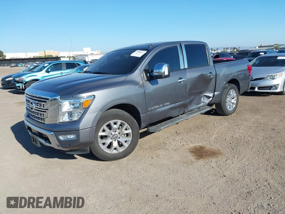 2020 Nissan Titan Platinum Reserve with VIN 1N6AA1EF8LN512582, listed as a IAAI auction lot 42236611 with 18,375 mi miles and . Bid and sale history available at DreamBid. Image 17.