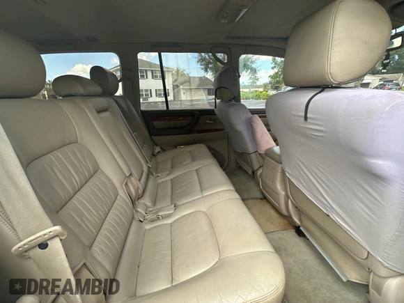 1998 Lexus LX 470 z VIN JT6HT00W7W0008417, wystawiony jako Copart lot #79324334 z przebiegiem 183 911 mil mil oraz Czysty tytuł • Clean title. Historia ofert i sprzedaży dostępna na DreamBid. Obrazek 6.