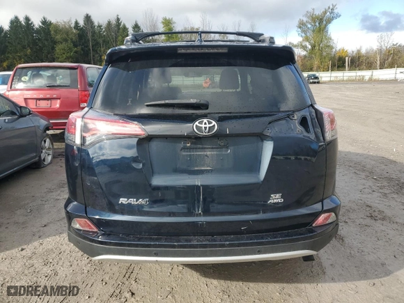 2018 Toyota RAV4 SE with VIN JTMJFREV5JD256043, listed as a Copart auction lot 75988284 with 101,468 mi miles and Salvage Title. Bid and sale history available at carsss.com. Image 6.