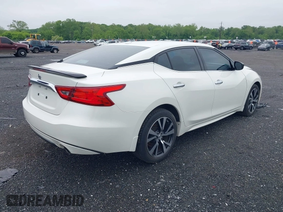 2016 Nissan Maxima SV z VIN 1N4AA6AP2GC375242, wystawiony jako IAAI lot #42220608 z przebiegiem 59 983 mil mil oraz . Historia ofert i sprzedaży dostępna na DreamBid. Obrazek 4.
