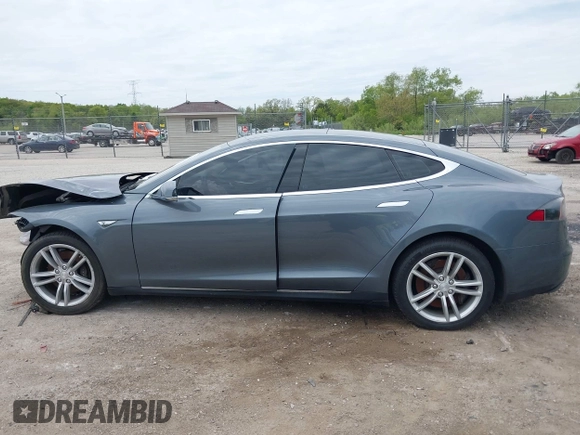 2013 Tesla Model S with VIN 5YJSA1CG9DFP27357, listed as a IAAI auction lot 42362514 with Not provided miles and . Bid and sale history available at DreamBid. Image 14.