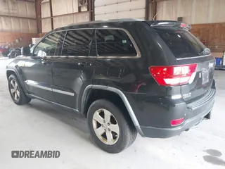 2012 Jeep Grand Cherokee Laredo with VIN 1C4RJFAT8CC182128, listed as a IAAI auction lot 40154044 with 239,601 mi miles. Bid and sale history available at carsss.com. Image 3.