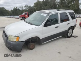 2003 Ford Escape XLS Value with VIN 1FMYU02B33KA49719, listed as a Copart auction lot 81483124 with 203,113 mi miles and Salvage Title. Bid and sale history available at carsss.com. Image 1.