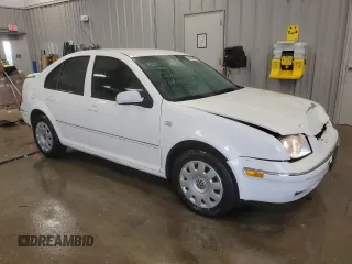 2004 Volkswagen Jetta GL with VIN 3VWRK69M54M098422, listed as a Copart auction lot 44006055 with 115,211 mi miles and Clean title. Bid and sale history available at DreamBid. Image 4.