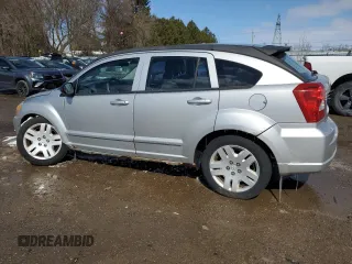 2010 Dodge Caliber SXT z VIN 1B3CB4HA4AD597158, wystawiony jako Copart lot #51757335 z przebiegiem 128 791 mil mil oraz Czysty tytuł • Clean title. Historia ofert i sprzedaży dostępna na DreamBid. Obrazek 2.