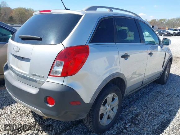 2014 Chevrolet Captiva Sport LS z VIN 3GNAL2EK5ES620965, wystawiony jako IAAI lot #41891173 z przebiegiem 160 342 mil mil oraz . Historia ofert i sprzedaży dostępna na DreamBid. Obrazek 4.