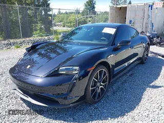 2023 Porsche Taycan z VIN WP0AA2Y12PSA14042, wystawiony jako IAAI lot #42356653 z przebiegiem 11 349 mil mil oraz . Historia ofert i sprzedaży dostępna na DreamBid. Obrazek 2.