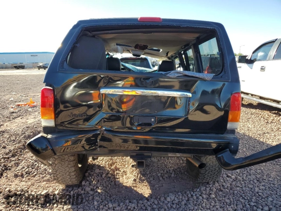 2000 Jeep Cherokee Limited with VIN 1J4FF68SXYL240792, listed as a Copart auction lot 80590604 with 0 mi miles and Salvage Title. Bid and sale history available at carsss.com. Image 6.