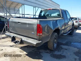 2003 Ford F-150 XL with VIN 1FTRX17L03NA40448, listed as a IAAI auction lot 41473201 with 1 mi miles. Bid and sale history available at carsss.com. Image 4.