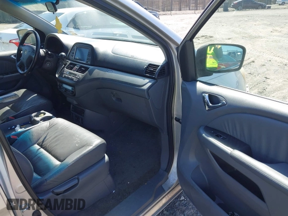 2007 Honda Odyssey EX-L with VIN 5FNRL387X7B080906, listed as a IAAI auction lot 41910061 with 229,717 mi miles and . Bid and sale history available at DreamBid. Image 5.