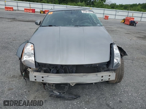 2005 Nissan 350Z Touring z VIN JN1AZ34E05M654954, wystawiony jako Copart lot #57591085 z przebiegiem Nie podano mil oraz Tytuł czysty. Historia ofert i sprzedaży dostępna na DreamBid. Obrazek 5.