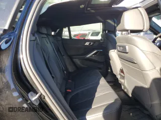 2021 BMW X6 M50i z VIN 5UXCY8C02M9F23734, wystawiony jako Copart lot #69432202 z przebiegiem Nie podano mil oraz . Historia ofert i sprzedaży dostępna na DreamBid. Obrazek 11.