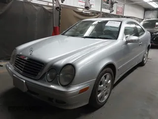 2001 Mercedes-Benz CLK with VIN WDBLJ65GX1T091389, listed as a IAAI auction lot 42058375 with 215,750 mi miles. Bid and sale history available at carsss.com. Image 2.