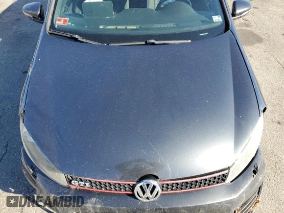 2012 Volkswagen GTI w/Conv & Sunroof with VIN WVWEV7AJ4CW125785, listed as a Copart auction lot 49780335 with 125,837 mi miles and Salvage title. Bid and sale history available at DreamBid. Image 11.